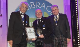 Former HCA chair Stewart McKenzie receiving the Wilma Wilkie Outstanding Service Award from HCA Vice President Mark Hayman and HCA Chair Brian Robb