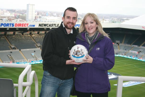 Photo of NUFC fans Claire and Keith Giles, prize winners, VenueMenu app